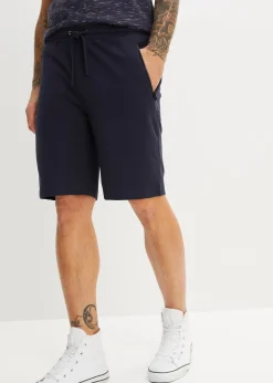 Bermuda sweat avec poches latérales zippées
