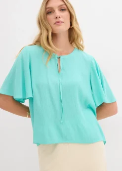 Blouse à manches papillon