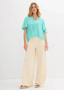 Blouse à manches papillon