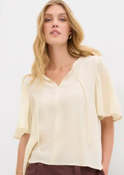 Blouse à manches papillon