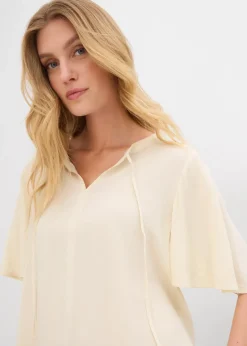 Blouse à manches papillon