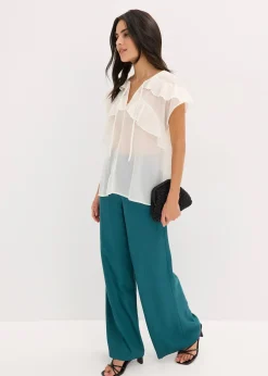 Blouse en crêpe à volants