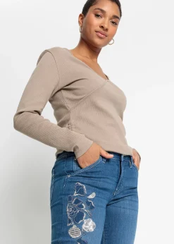 Jean Flare avec broderies florales