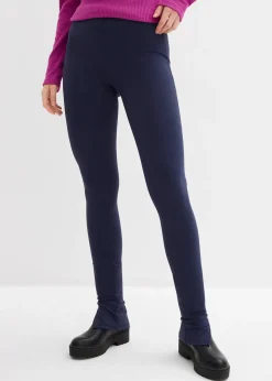 Legging avec fermeture zippée dans la couture