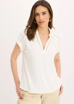 Polo en maille piquée de viscose avec empiècement en dentelle