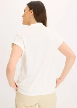 Polo en maille piquée de viscose avec empiècement en dentelle