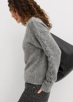 Pull boxy avec motif tressé sur les manches