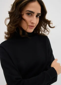 Pull col roulé