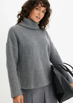 Pull col roulé en maille côtelée