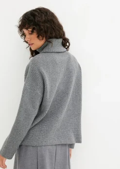Pull col roulé en maille côtelée