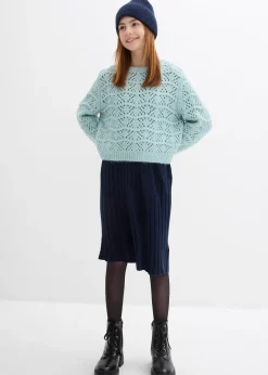 Pull en grosse maille à broderie ajourée