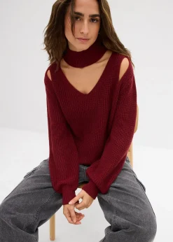 Pull en grosse maille avec découpes