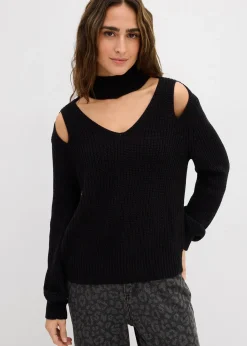 Pull en grosse maille avec découpes