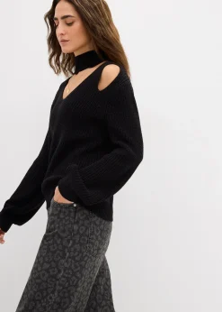 Pull en grosse maille avec découpes