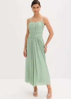 Robe longue en mesh, avec plusieurs façons de la porter
