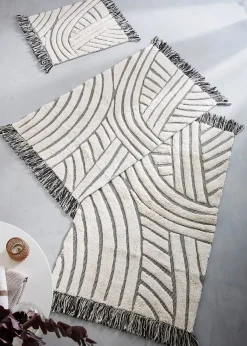 Tapis de bain à motif graphique