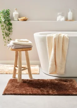 Tapis de bain à surface brillante