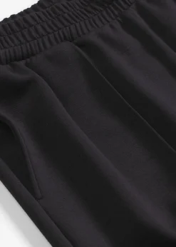 Tenue d’intérieur en matière néoprène avec veste raccourcie