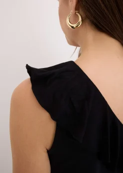 Top asymétrique avec volant en viscose douce et extensible