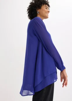 Tunique plus longue derrière